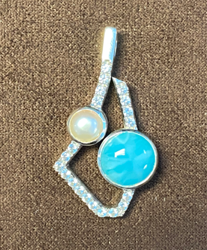 Add some Elegance to any outfit with the Serenade Larimar Pendant in silver with larimar by marahlago
